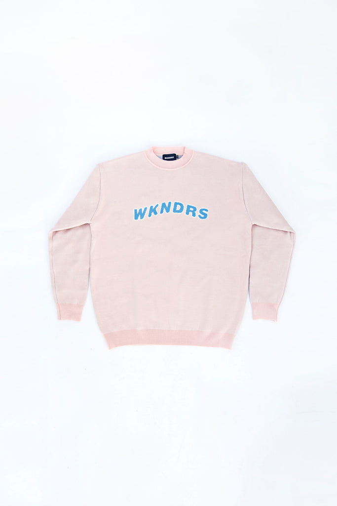 Wavy WKNDRS Sweater in Pink | Sweaters and Accessories, Long sleeve knit sweater in ivory with wavy logo graphic knit at face. A perfect soft sweatshirt to throw over for Summer nights at the beach or to layer during the Winter months. Made in Korea. Shop more trending fits and lifestyle items including Summer head accessories and aesthetic coffee mugs to add to your home!