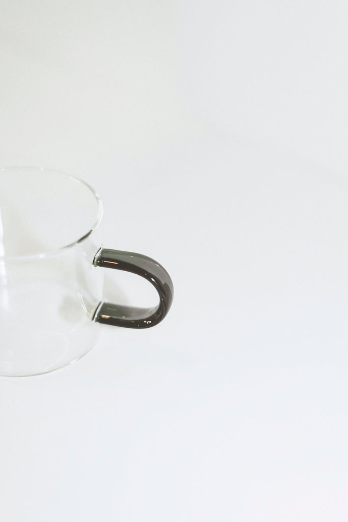 Lotta Smoke Handle Coffee Cup | Aesthetic Lifestyle and Home Accents, Individually hand-blown borosilicate glass with handle accent. It's the perfect espresso cup to add to your cup collection. Shop more aesthetic home accents and trending accessories!