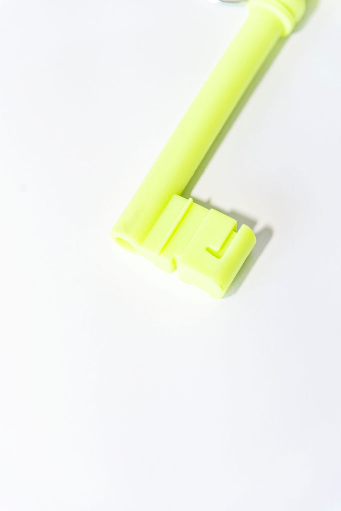 Silicone Key Chain in Neon | Aesthetic Lifestyle Items A part of the reality series by Harry Allen, inspired by the beauty of everyday objects. An 18th-century Italian church-key in an oversized silicone keychain. Includes stainless steel ring to hold your keys. Discover trending and aesthetic home decors and lifestyle items!