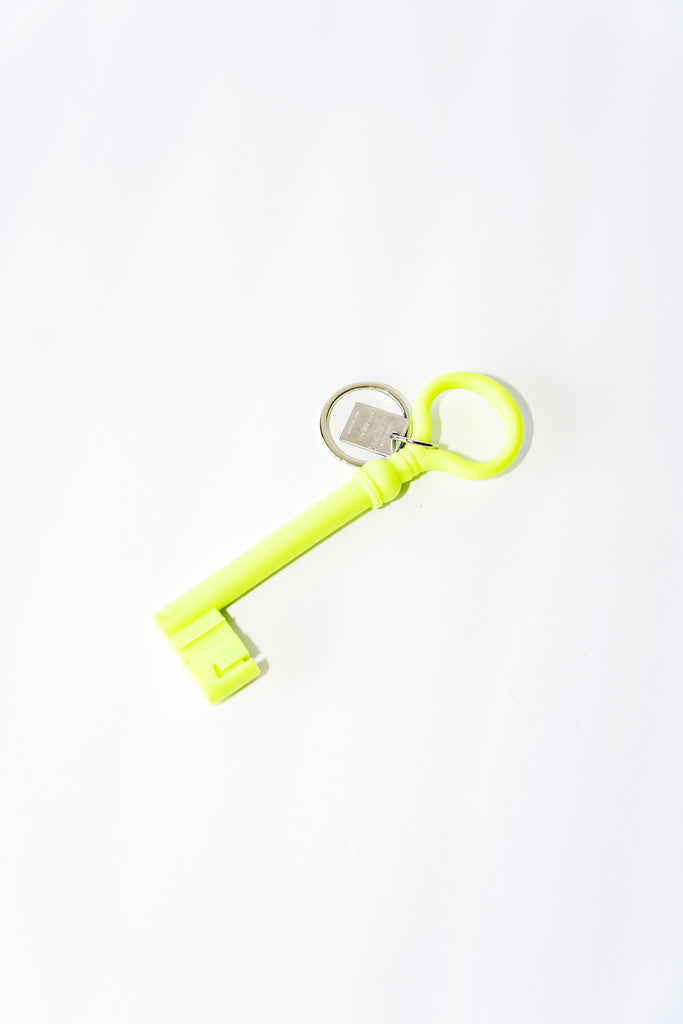 Silicone Key Chain in Neon | Aesthetic Lifestyle Items A part of the reality series by Harry Allen, inspired by the beauty of everyday objects. An 18th-century Italian church-key in an oversized silicone keychain. Includes stainless steel ring to hold your keys. Discover trending and aesthetic home decors and lifestyle items!