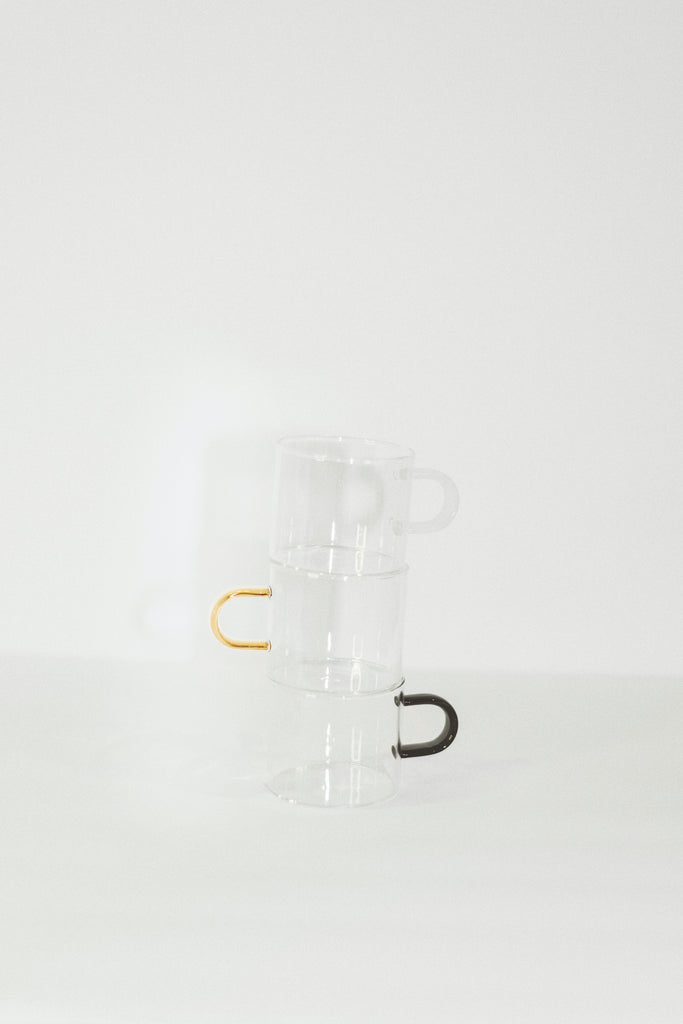Lotta White Jade Handle Coffee Cup | Aesthetic Lifestyle and Home Accents, Individually hand-blown borosilicate glass with handle accent. It's the perfect espresso cup to add to your cup collection. Shop more aesthetic home accents and trending accessories!